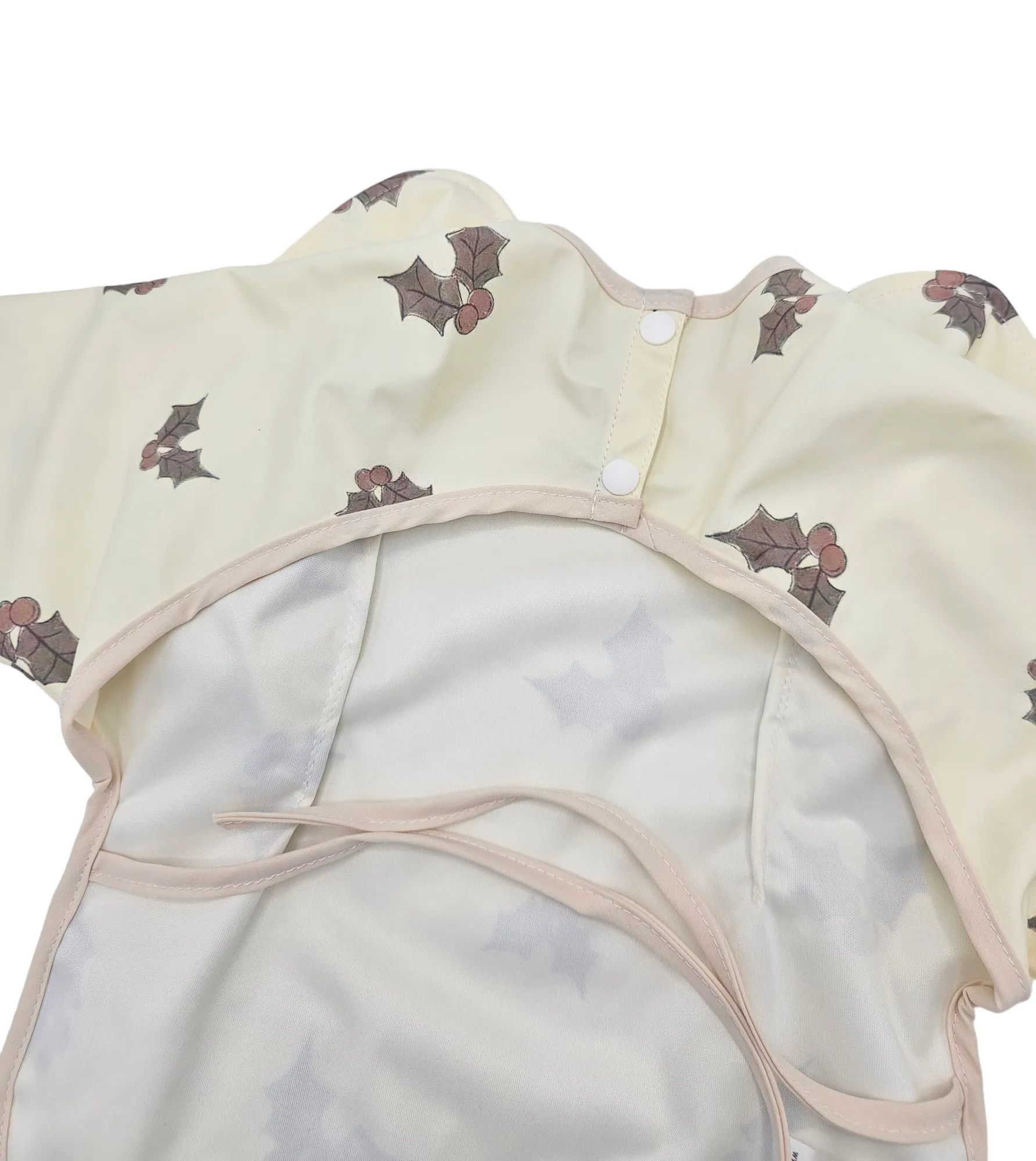 Cream Holly Print Frill Detailed Waterproof Bib with Sleeves - Limited Edition Christmas Collection